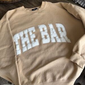 The Bar Beige Varsity Sweatshirt